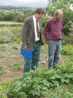 An organic inspector inspect the crops